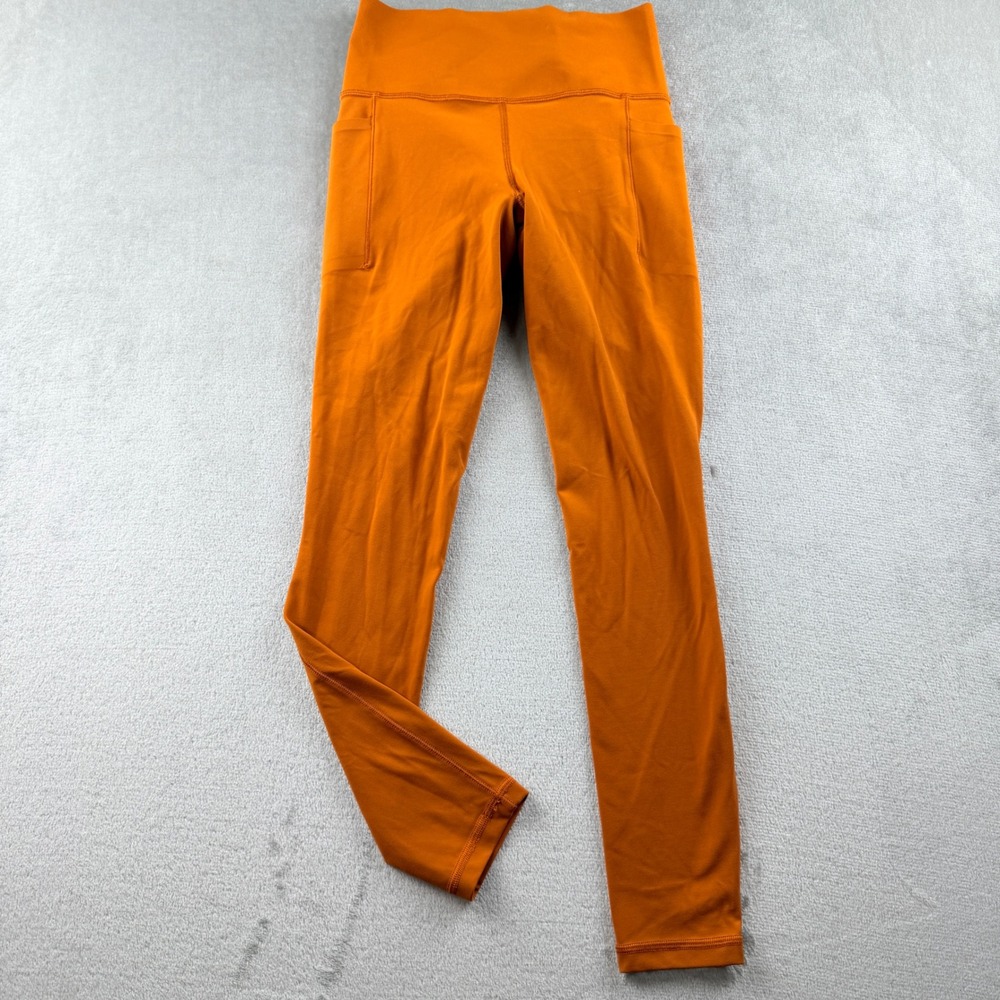 Athleta Women's XS Salutation Stash Leggings Orange 7-8 Length High Rise Pockets